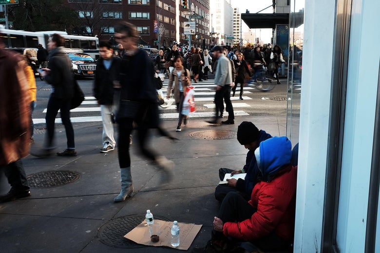 NEW YORK, NY - NOVEMBER 20: Homeless men panhandle on the street on November 20, 2015 in New York City. New York City Police Commissioner William Bratton said on Thursday that homelessness in New York City had 'exploded' over the past two years. Currently around 58,000 people are in the city's homeless shelters, a number which is up from the administration of Mayor Michael Bloomberg. (Photo by Spencer Platt/Getty Images)